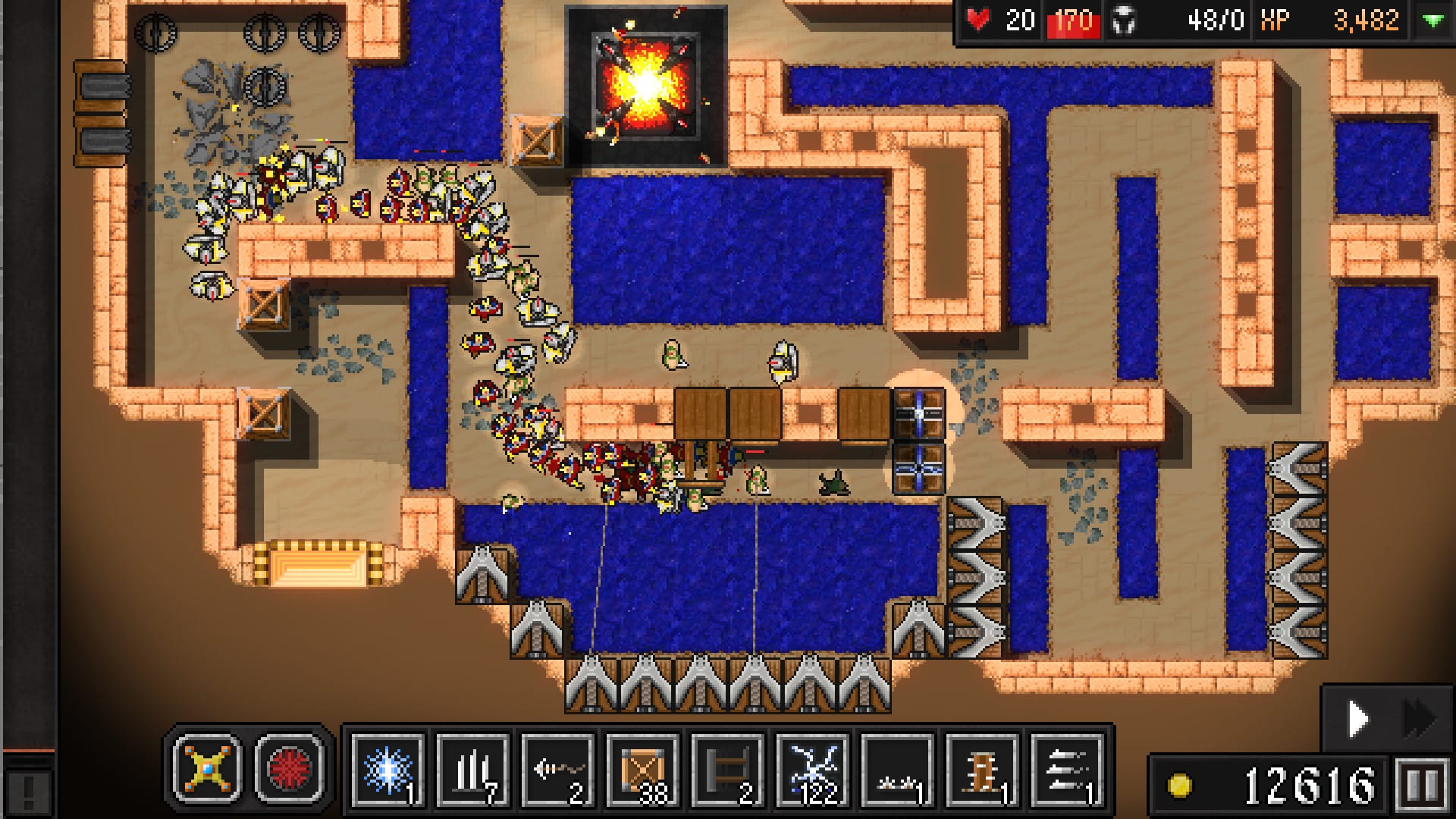 Dungeon Warfare 2 gameplay showing physics-based traps flinging adventurers down a dungeon corridor