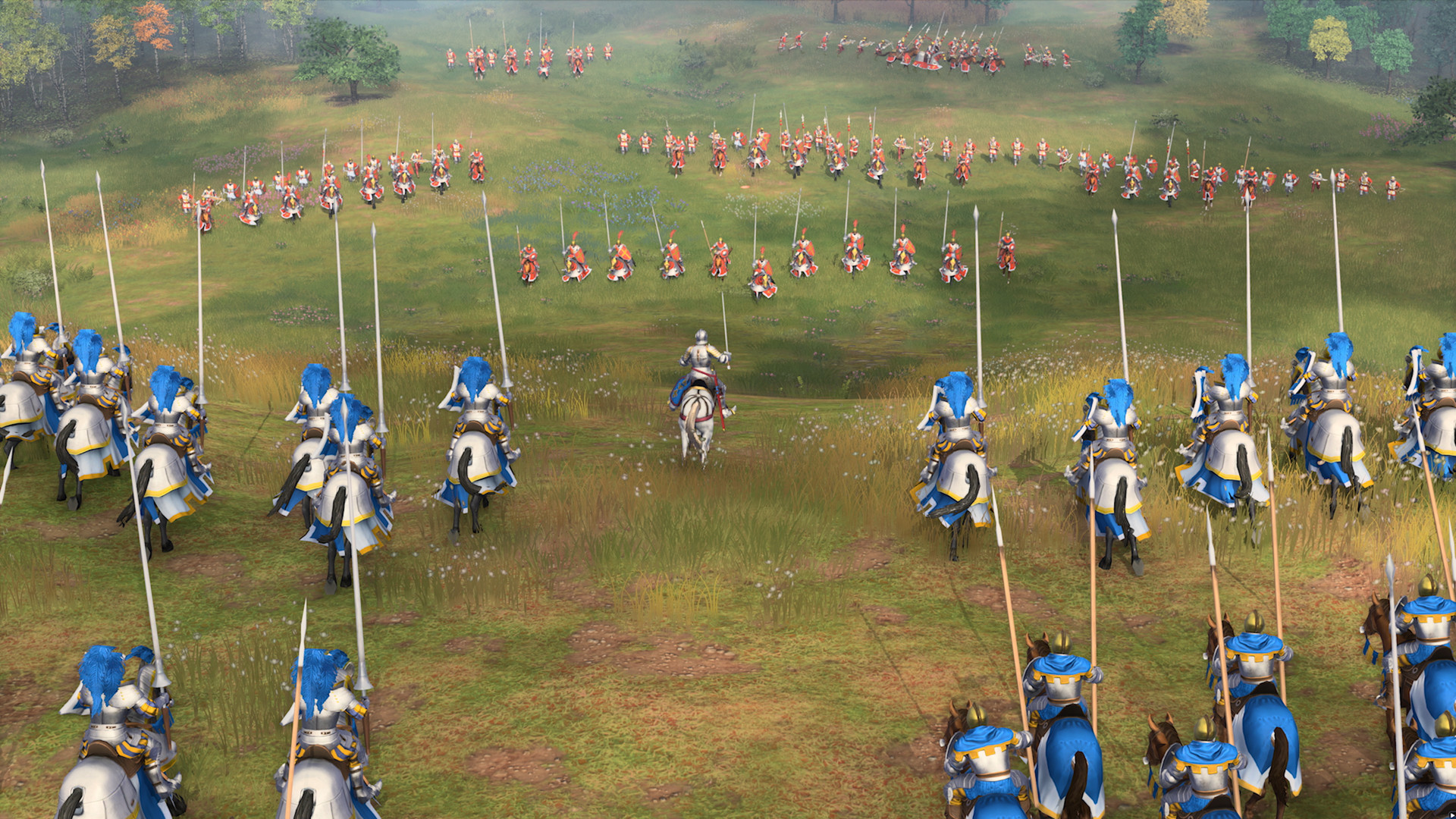 Age of Empires IV gameplay showing a medieval siege with infantry, cavalry, and a fortified town