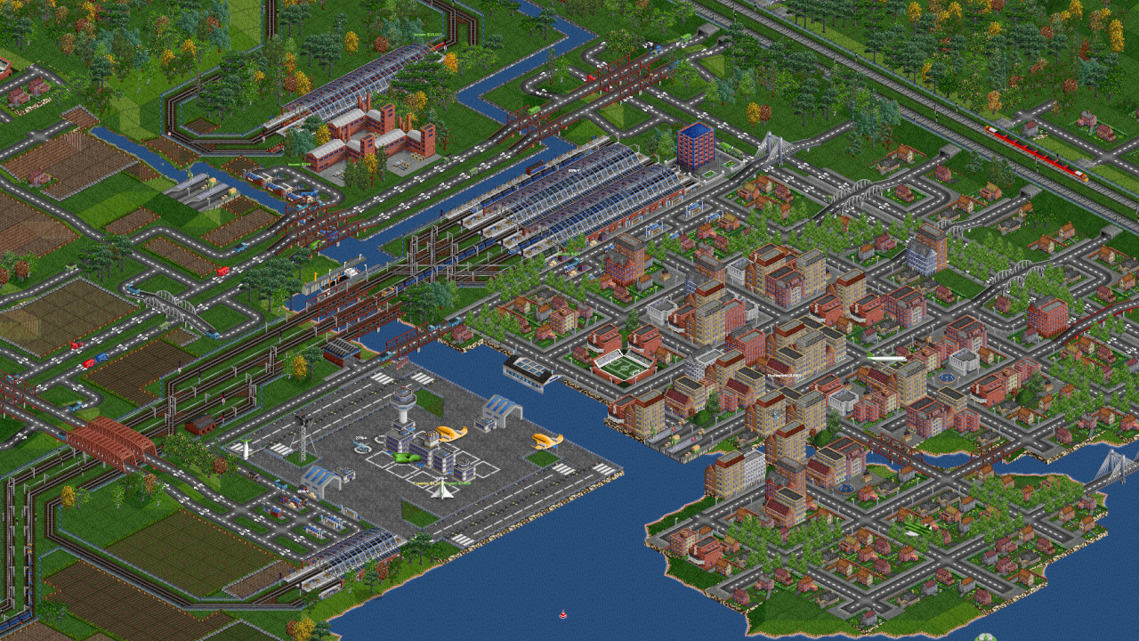 OpenTTD rail and road network spanning a generated map
